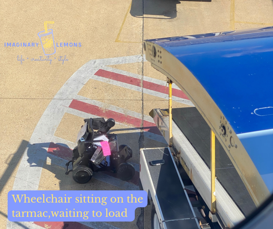 Power wheelchair sits on the tarmac, beside the conveyer belt to load the plane